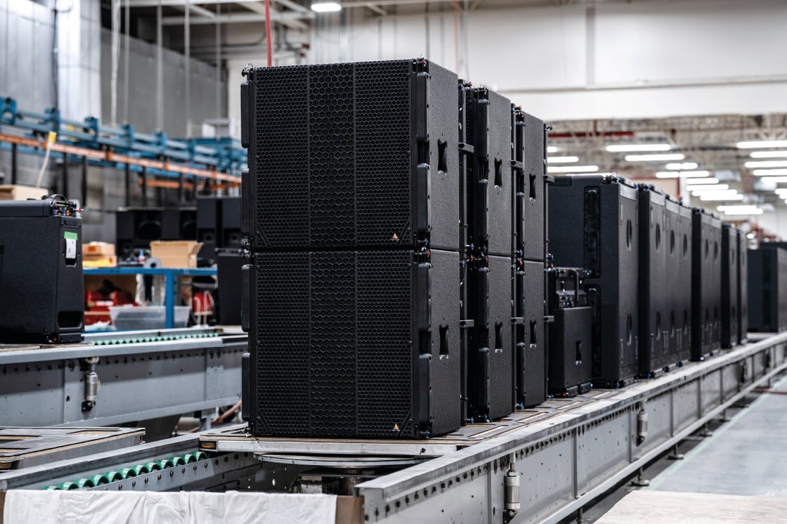 Adamson speakers on an assembly line.
